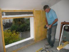 John builds wall for insulation loft