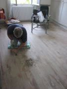 John starts preparing floors for sanding on middle floor