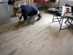 Removing glue off wooden floors