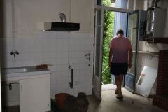 Kitchen work commences, stripping out old pipes and boiler