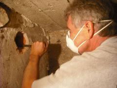 John working in basement