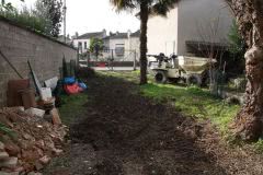 Tina and I stack all the rubble from the house