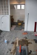 Tiling continues, shower goes in next, John's knee's throb a bit