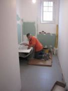 New floor in, work starts on bathroom wall's