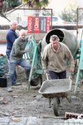 Alan, Mike, Jackie all help with concreting