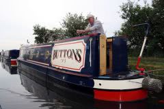Cleaning canal boat Buttons, for her arrival into Liverpool