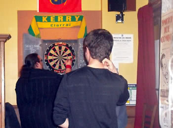 playing darts in Irish pub the Celt in Carcassonne