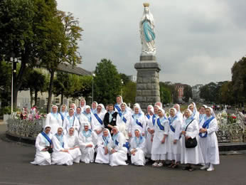 Nuns posing for photos on Rosary square